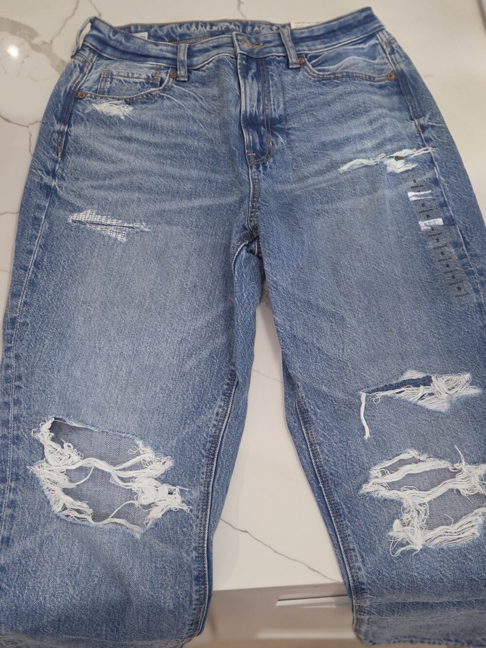 Distressed Light Blue Ripped Jean